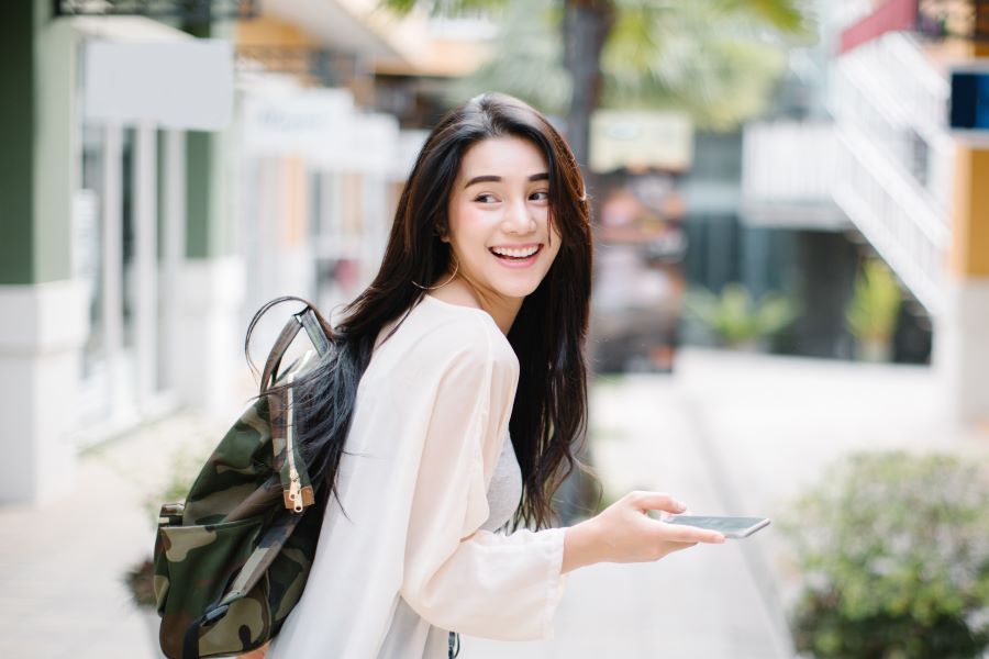 happy asian woman with no makeup